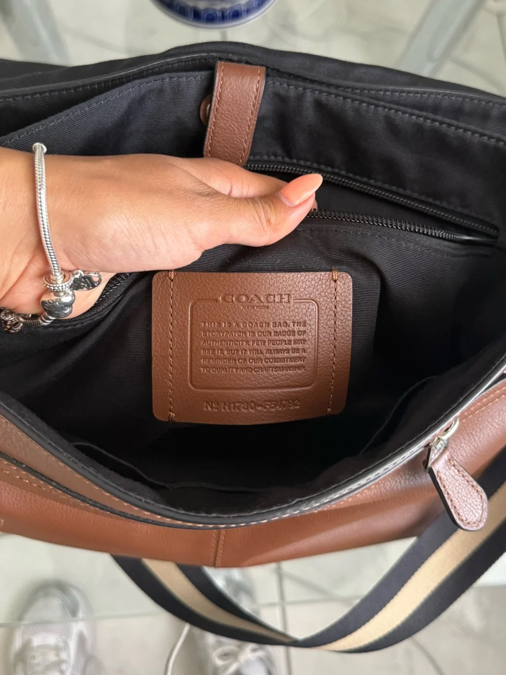 Coach Brown Leather Messenger Bag with Striped Strap